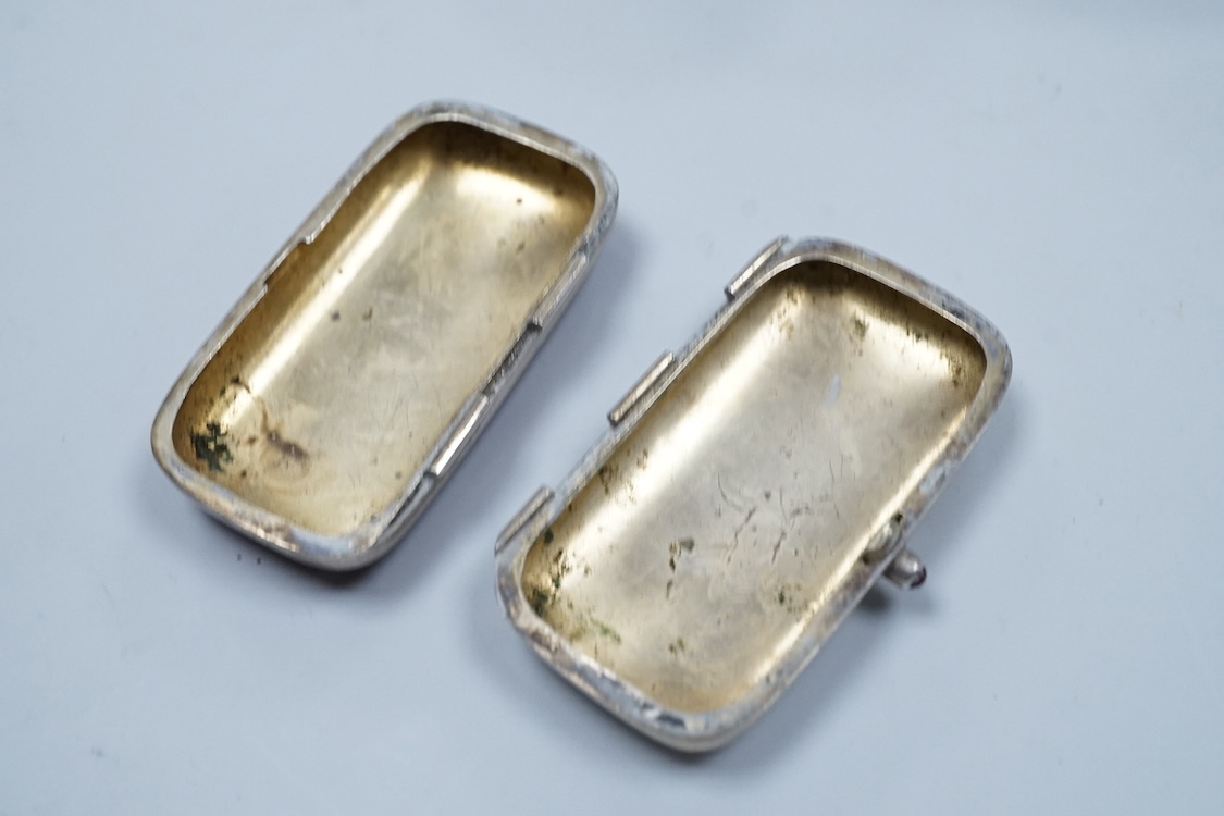 A continental 935 standard white metal oval box, with inset frosted glass and marcasite set hinged cover, 82mm, together with three assorted small pill boxes, including enamelled(a.f.), an Italian 800 standard and a mode